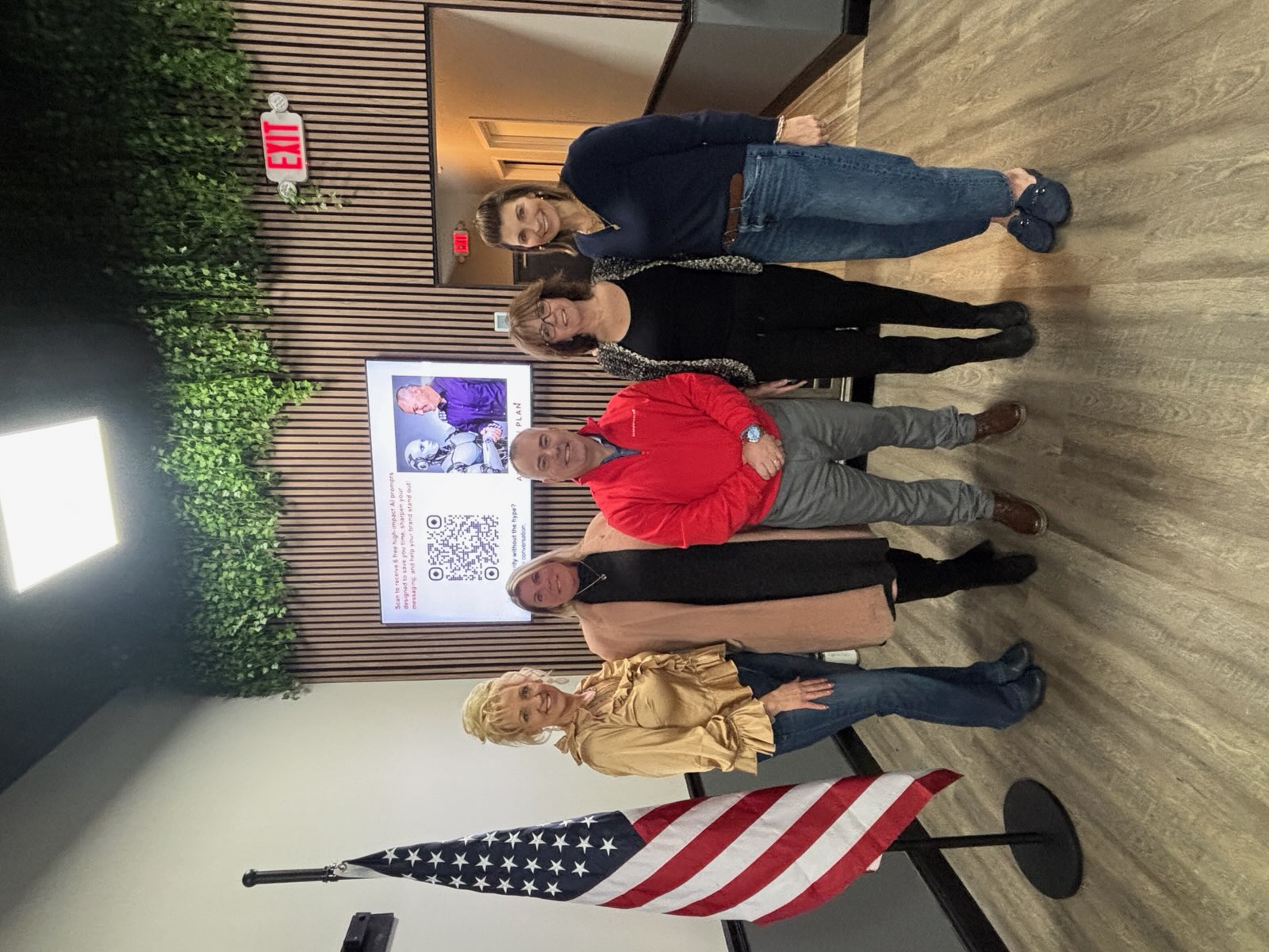 Joe Bouffard with attendees following a community AI presentation