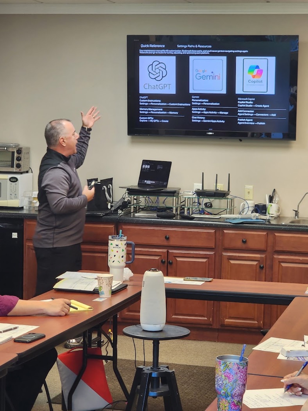 Joe Bouffard guiding a small group through AI tools